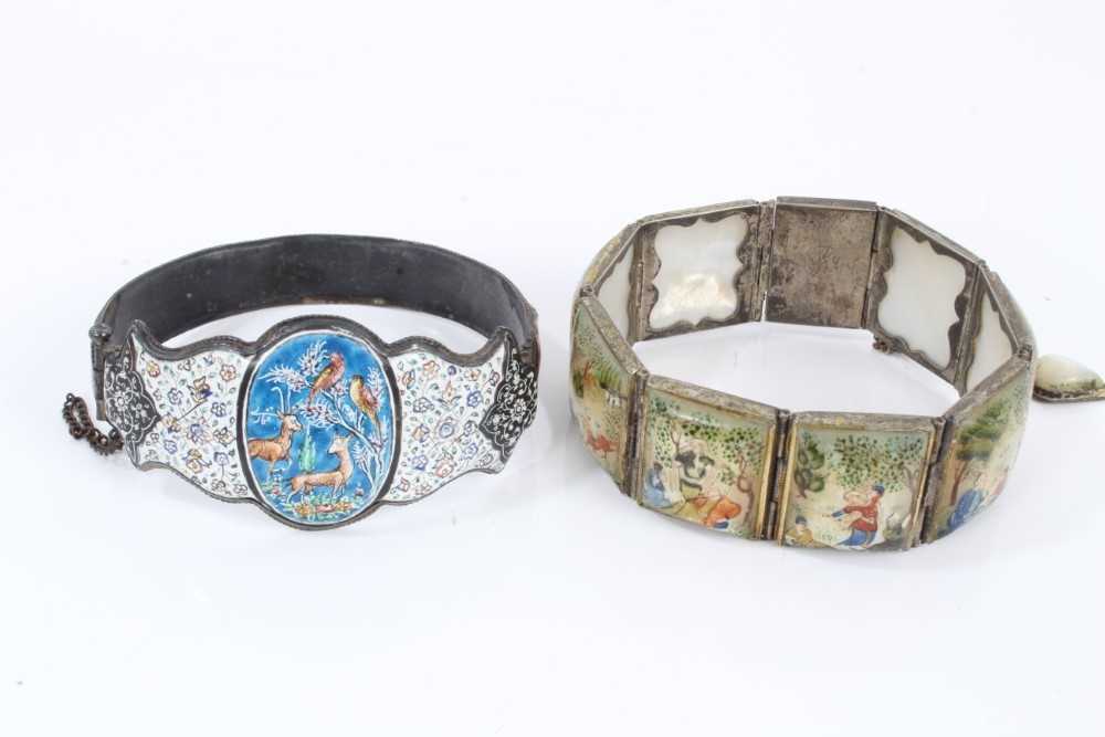 Lot 585 - Antique Persian enamel bangle and a Persian mother of pearl bracelet with polychrome painted decoration (2)