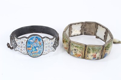 Lot 585 - Antique Persian enamel bangle and a Persian mother of pearl bracelet with polychrome painted decoration (2)