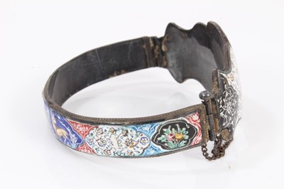 Lot 585 - Antique Persian enamel bangle and a Persian mother of pearl bracelet with polychrome painted decoration (2)