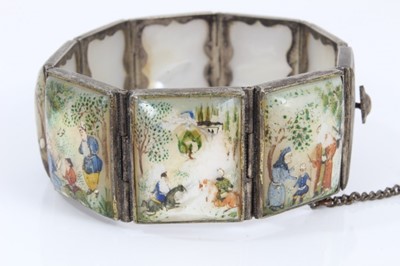 Lot 585 - Antique Persian enamel bangle and a Persian mother of pearl bracelet with polychrome painted decoration (2)