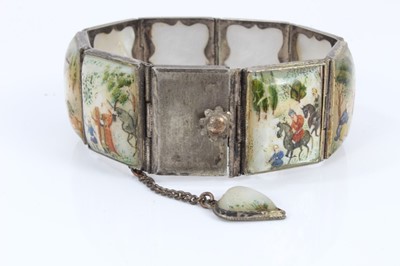 Lot 585 - Antique Persian enamel bangle and a Persian mother of pearl bracelet with polychrome painted decoration (2)
