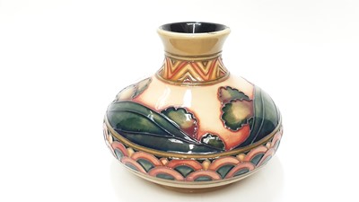 Lot 1152 - Moorcroft pottery vase decorated in the Second Dawn Eventide pattern vase, dated 2012, 11cm high