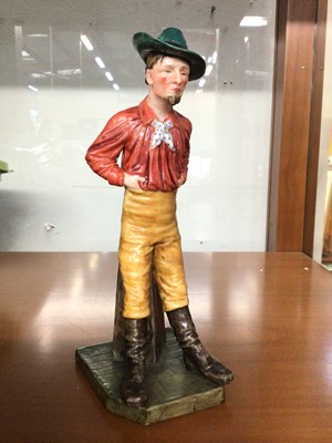 Lot 408 - Royal Worcester male figure wearing a hat, numbered 836 to base.