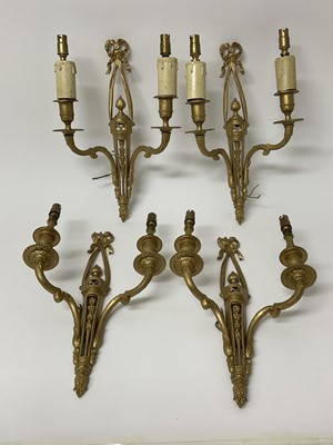 Lot 251 - Set of four good quality George III style gilt brass wall lights