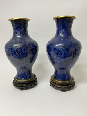 Lot 224 - Large pair of Chinese cloisonné blue enamel vases on carved wooden stands