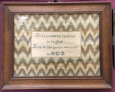 Lot 391 - Religious needlework sampler in oak frame