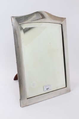 Lot 407 - Continental silver table mirror with wooden back and strut support, hallmarked to edge, c.1910