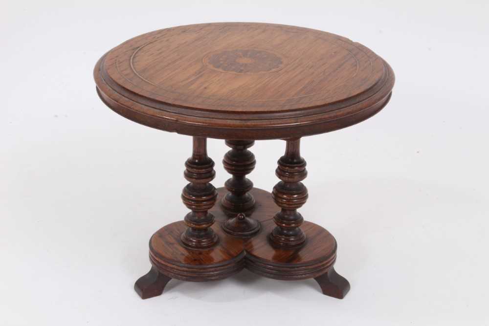 Lot 983 - A fine quality rosewood and inlaid apprentice piece miniature table with tilt top, c.1870