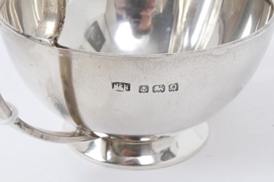 Lot 411 - 1940's matching silver cream jug and bowl in the Christopher Dresser style