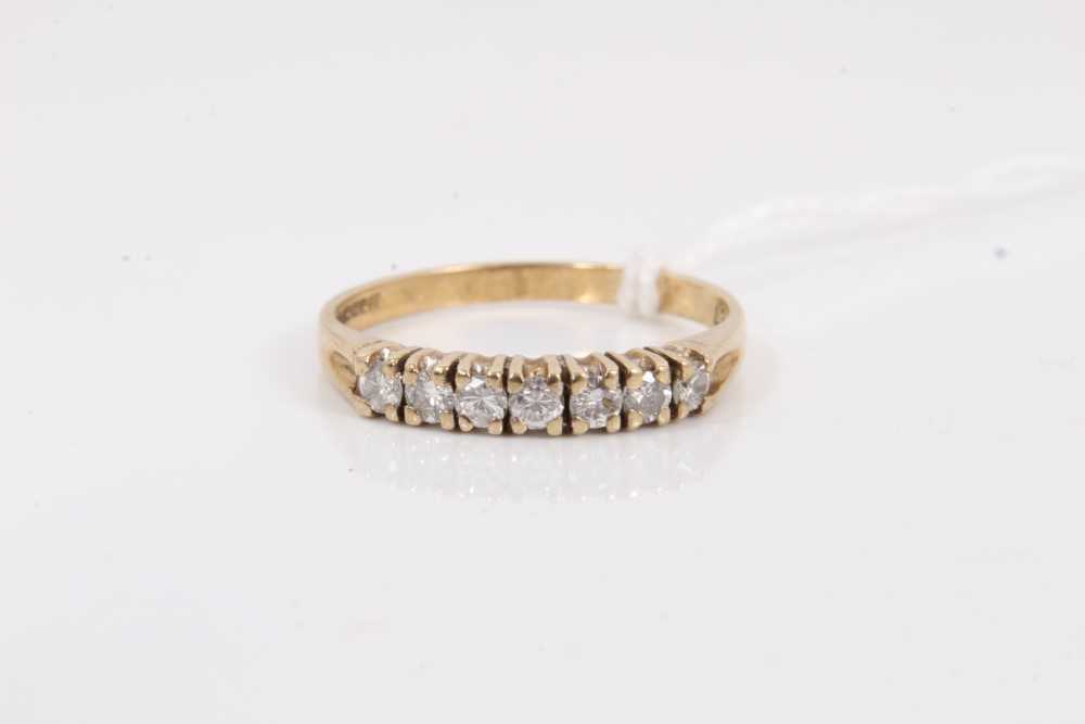 Lot 138 - 9ct gold diamond seven stone ring