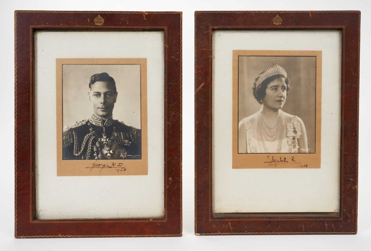 Lot 70 - T.M. King George VI and Queen Elizabeth, pair of signed presentation portrait photographs dated 1938, in origianl leather frames