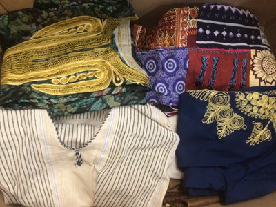 Lot 2124 - West African textiles to include snakeskin and leather bags, traditional tribal clothing.