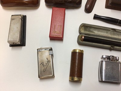 Lot 2425 - Group of smoking paraphernalia, including a Dunhill lighter, gold mounted cheroot holder, leather cigar case, etc