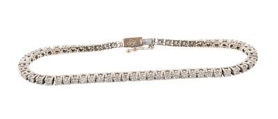 Lot 788 - Diamond tennis bracelet with a line of round brilliant cut diamonds in 18ct white gold setting.