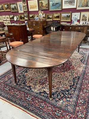 Lot 1298 - Good quality Georgian-style oak extending D-end dining table on square taper legs terminating on brass castors, 292cm long x 130cm wide x 77cm high