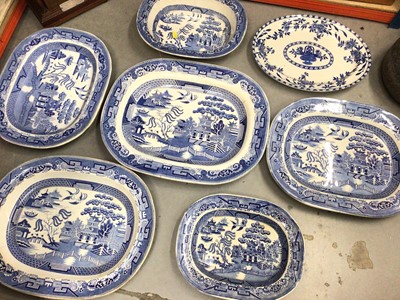 Lot 428 - Group of Victorian blue and white china, including Willow pattern platters and serving dish