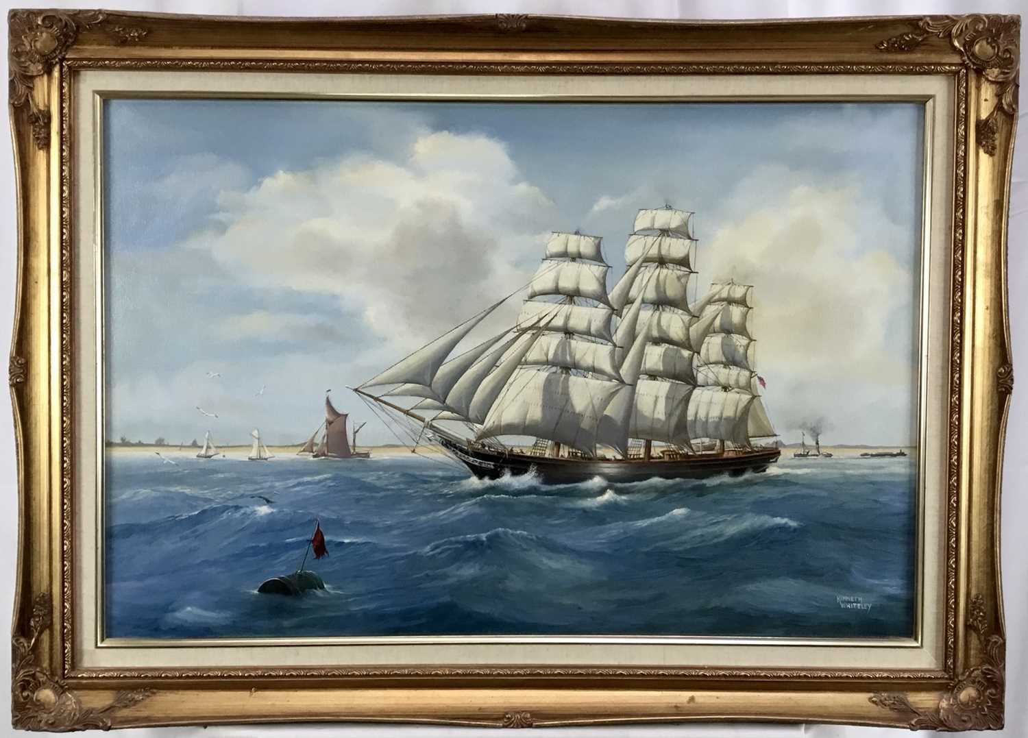 Lot 38 - Kenneth Whitely oil on canvas - The Cutty Sark off the coast, signed, 75cm x 50cm, framed