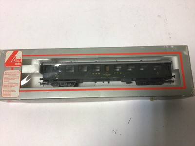 Lot 197 - Triang Hornsby HO gauge Canadian CN 101 passenger carriage No 3521, plus Hornsby OO gauge LMS red dining car 228 R4095A and Limo OO gauge Class SBB carriage No 309159, all boxed (3)