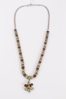 Lot 816 - Multi-gem necklace with garnets, peridots and citrines in silver setting on 18ct white gold chain link necklace