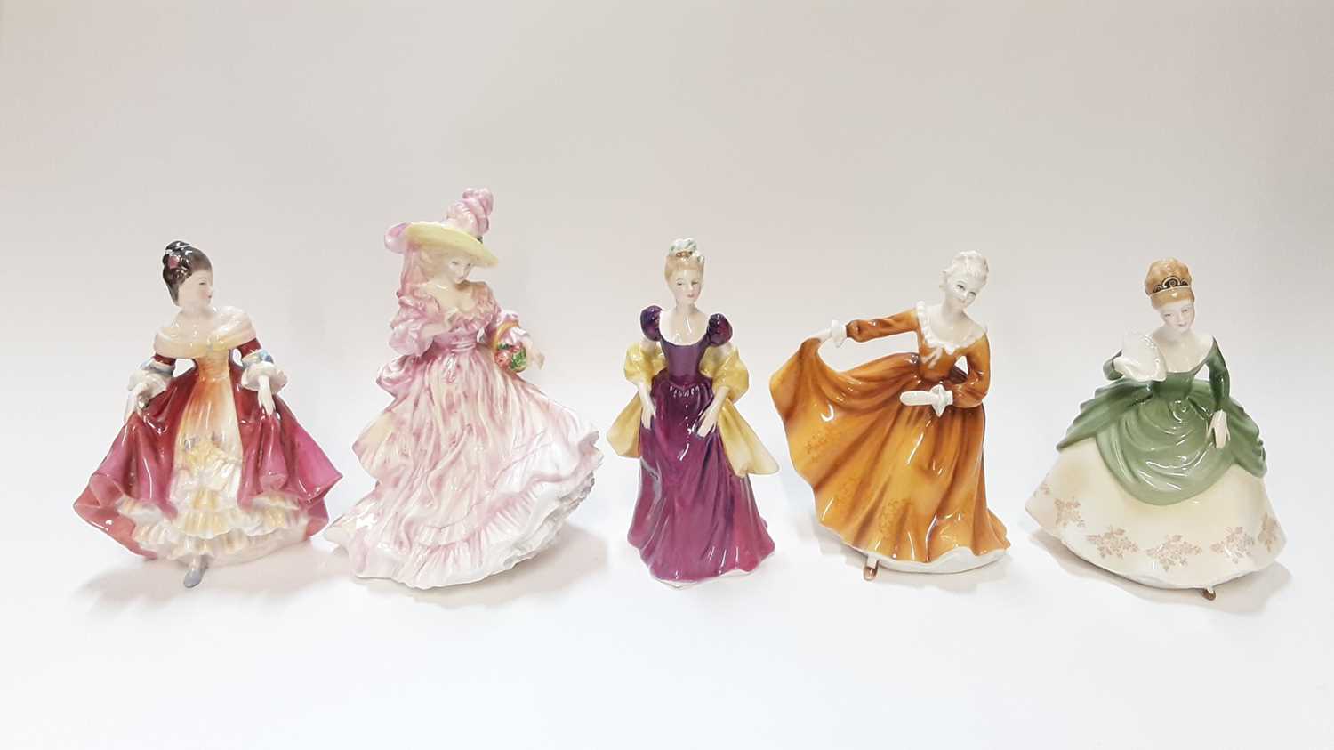 Lot 1254 - Five Royal Doulton porcelain figurines