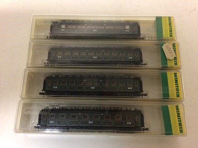Lot 209 - Minitrix N gauge 2-6-2 locomotive and tender 23015, plus a selection of carriages nd rolling stock (QTY)