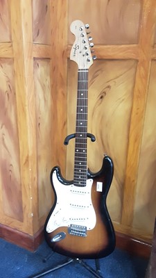 Lot 2252 - Squier Strat by Fender left-handed electric six string guitar, 20th Anniversary Edition