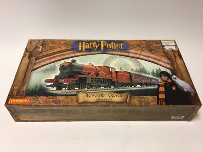Lot 230 - Hornby OO gauge Howarts Express boxed train set including 4-6-0 Castle and County "Howarts Castle" locomotive and tender 5972, one composite and one brake coach, Hogsmeade Station, Harry Potter and...