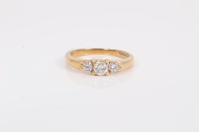 Lot 649 - Diamond three stone ring