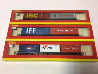 Lot 248 - Hornby OO gauge rolling stock including Trainsrail VDA closed van (x5), R6138, EWS curtain sided wagon (x4), R6137, three other container wagons, Mainline Courtaulds plank wagons (x3), No. 37-151,...