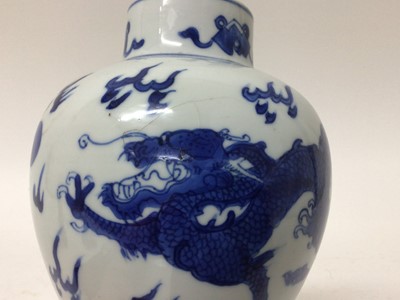 Lot 202 - 19th century Chinese porcelain blue and white baluster shape vase with a carved wooden cover
