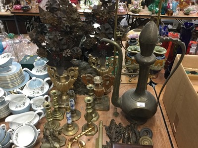 Lot 603 - Group of brass candle sticks, Islamic copper jug and other metalwares.