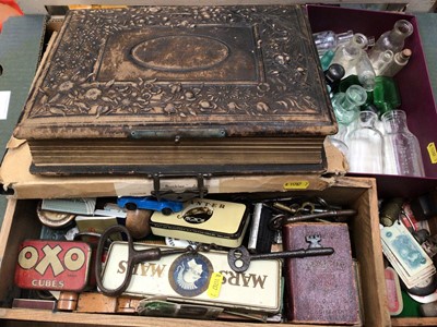 Lot 453 - Victorian leather photograph album containing family portraits, and a collection of miscellaneous items to include AA  badge etc