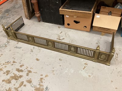 Lot 1406 - Edwardian brass fender