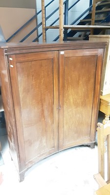 Lot 1261 - Nineteenth century mahogany concave cupboard with shelves