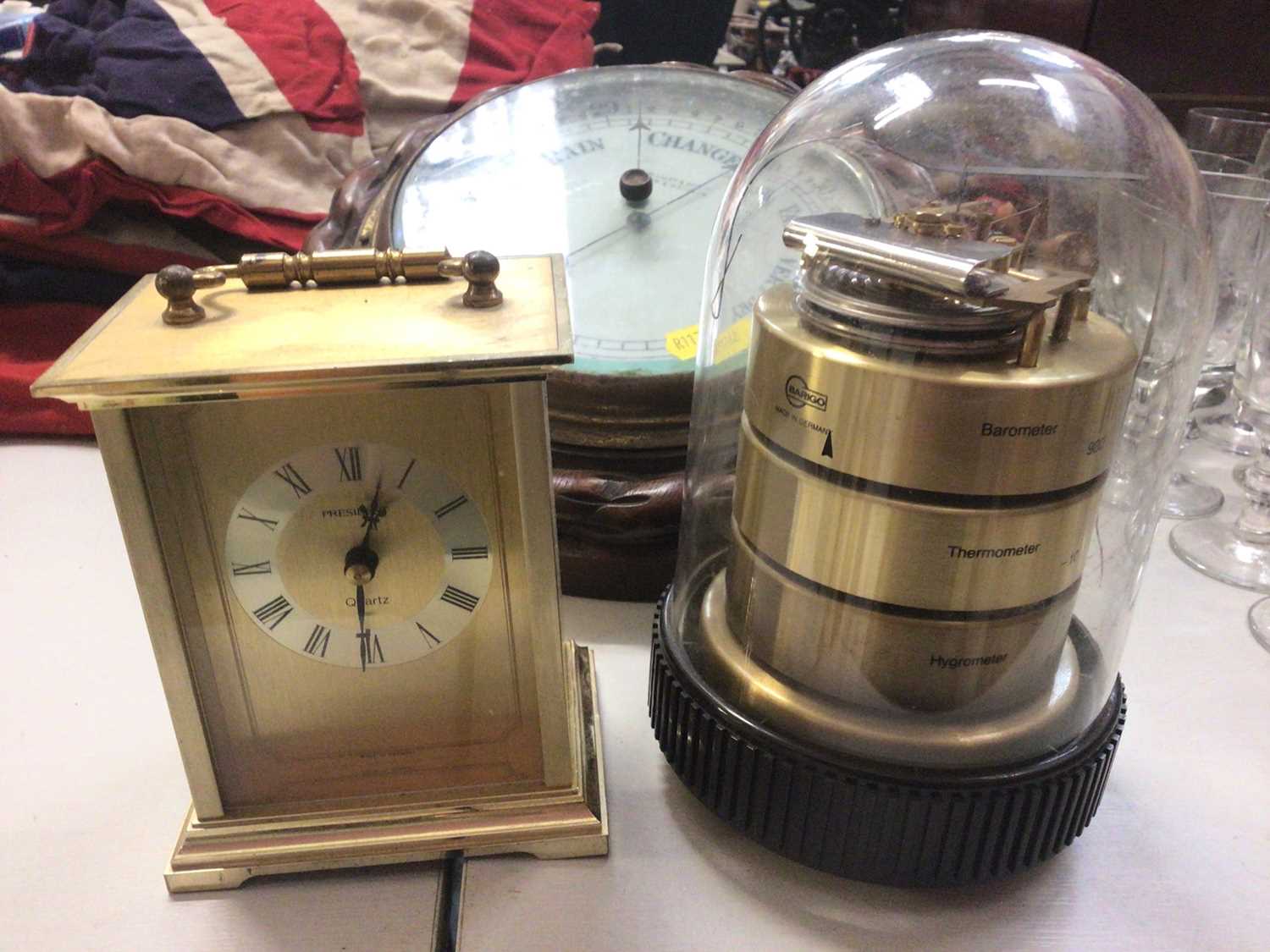 Lot 330 - Contemporary Barigo weather station under a plastic dome, John Lilley & Son wall barometer and President quartz desk timepiece