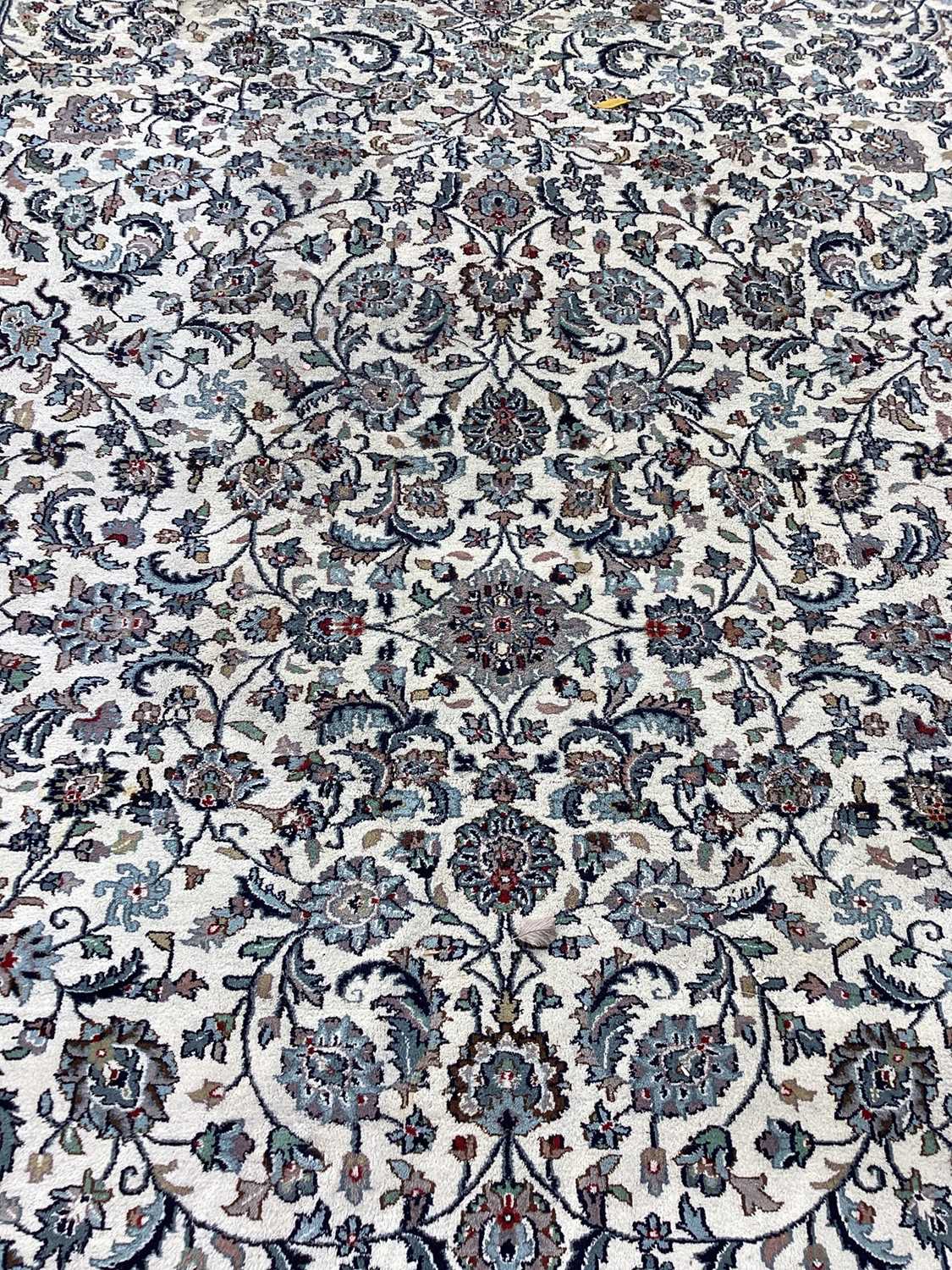 Lot 1538 - Large Kashan carpet on cream ground, approximately 454 x 309cm