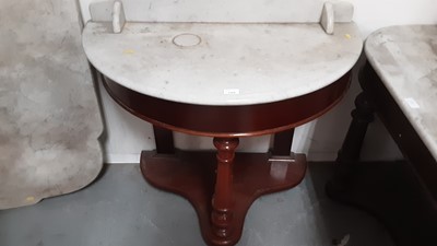 Lot 1388 - Two Victorian mahogany wash stands with marble tops, three other marble tops (5)