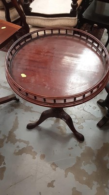 Lot 1205 - Mahogany tilt top wine table with gallery decoartion