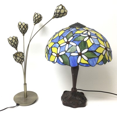 Lot 377 - Tiffany style table lamp with blue, yellow and green floral shade