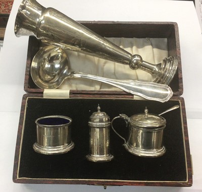 Lot 1026 - Silver three piece cruet set in fitted case, silver spill vase and German silver ladle