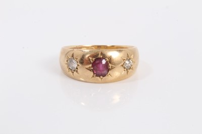 Lot 775 - Edwardian 18ct gold ruby and diamond three stone gypsy ring