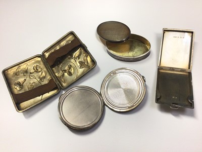 Lot 12 - French silver cigarette case with embossed floral decoration, small silver card case, silver powder compact and white metal oval trinket box with mother of pearl cover