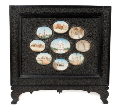 Lot 945 - Fine set of nine 19th century Indian miniature architectural paintings, set in a carved ebonised frame