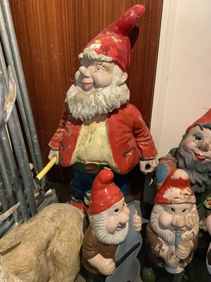 Lot 10 - Five garden gnome ornaments with one other