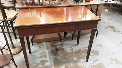 Lot 1282 - George III mahogany tea table on square chamfered legs, together with an Edwardian mahogany oval occasional table (2)