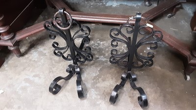 Lot 1362 - Antique pair of French wrought iron Fleur de lis fire dogs, together with a wrought iron candlestand and two coal buckets