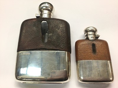 Lot 158 - Silver mounted spirit flask and a smaller plated spirit flask