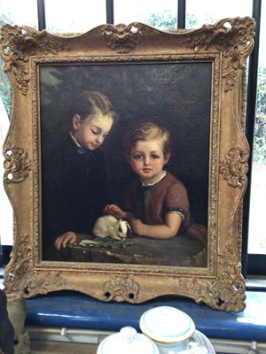 Lot 83 - Arthur Ackland Hunt (act. 1863-1913) oil on canvas - two children with a baby rabbit, signed and dated 1868, in gilt frame