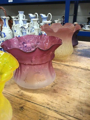Lot 30 - Four Edwardian frosted and tinted glass oil lamp shades