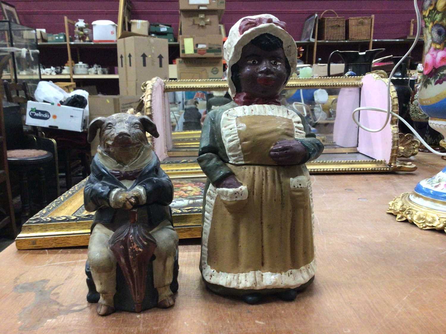 Lot 20 - Two Austrian terracotta figural boxes, one in the form of a pig seated on a chair, marked JM for Johann Maresch, the other a black woman